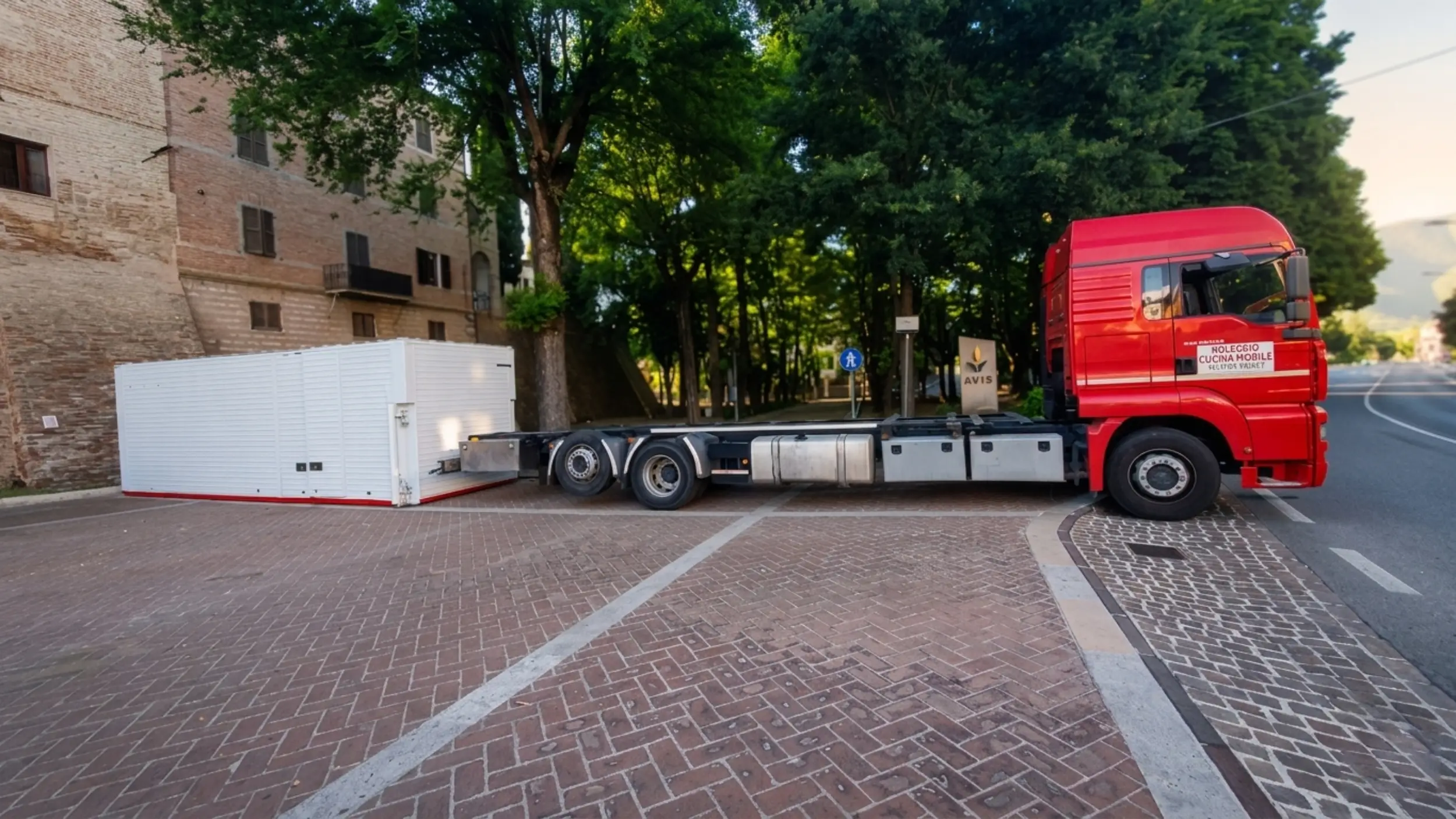 Cucina mobile container a gas N.8 Buratti Catering — fase finale dello scarico, container posizionato a terra sugli stabilizzatori e pronto all'uso